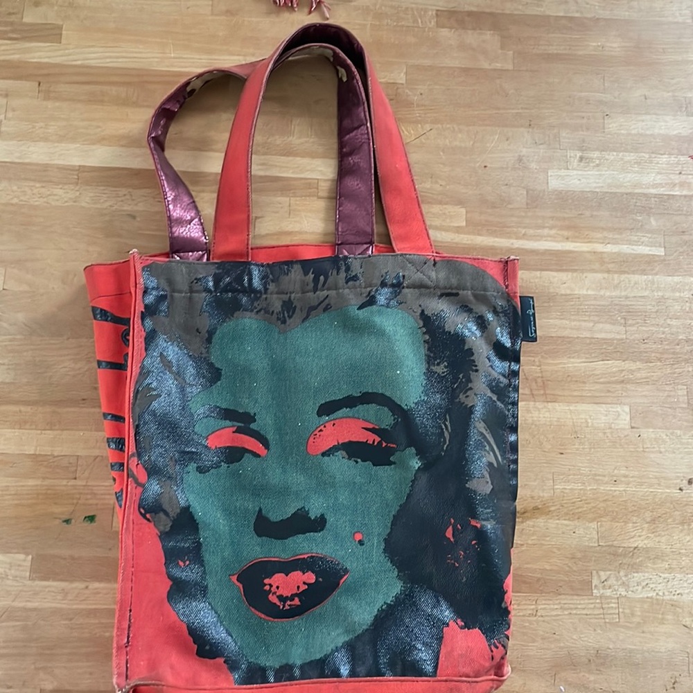Andy Warhol shoulder bag. Pop art icon to carry around. Some were on on straps.